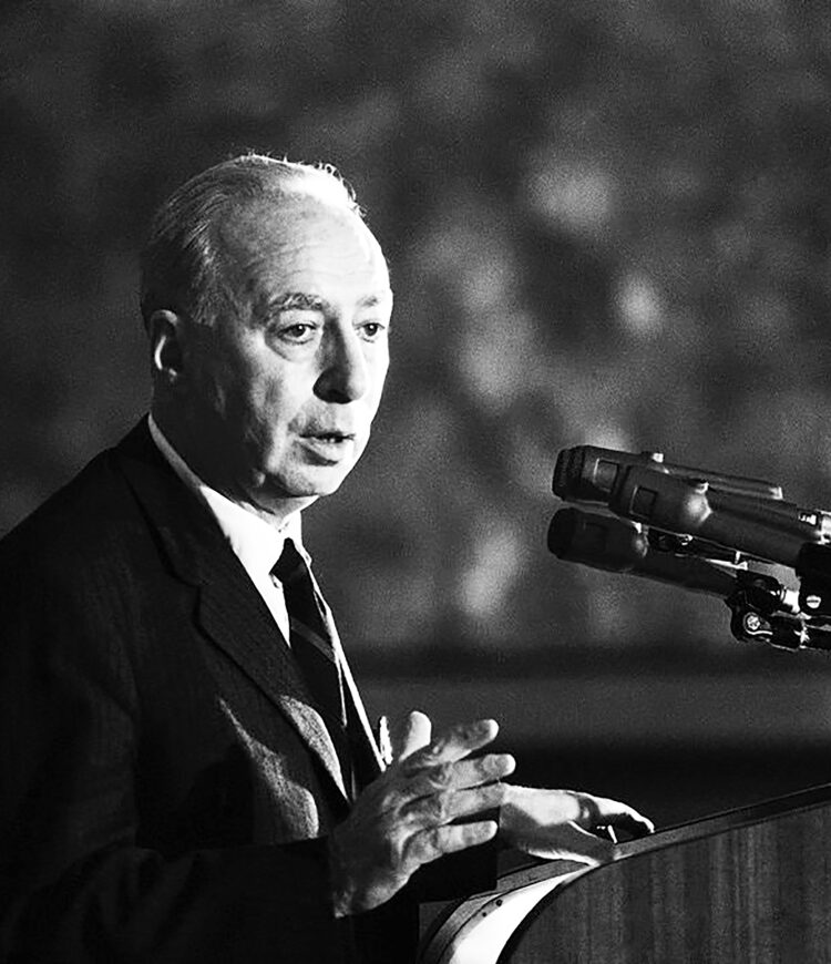 photo of Hans Morgenthau speaking at a podium