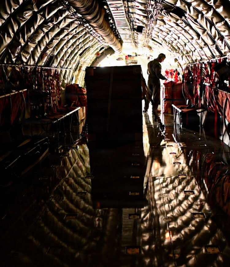 U.S. Air Force Airman 1st Class Christian De Jesus De Jesus, 91st Air Refueling Squadron boom operator, performs a pre-flight check onboard a KC-135 Stratotanker aircraft during Exercise Global Thunder 26 at MacDill Air Force Base, Florida, Oct. 22, 2025. Global Thunder is an annual command and control exercise designed to train U.S. Strategic Command forces and assess joint operational readiness. Mobility Airmen regularly participate in annual U.S. Stratigic Command exercises and aerial refueling training missions to maintain a safe, secure, effective and ready nuclear deterrent. (U.S. Air Force photo by Airman 1st Class Helen Ly)