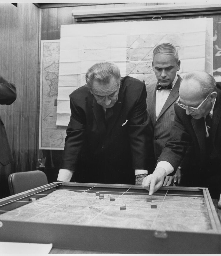 Walt Rostow shows President Lyndon B. Johnson a model of the Khe Sanh area